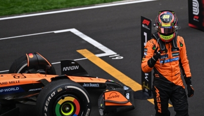 McLaren's Australian driver Oscar Piastri celebrates winning the Formula One Chinese Grand Prix at the Shanghai International Circuit in Shanghai on March 23, 2025. (Photo by Jade GAO / AFP)