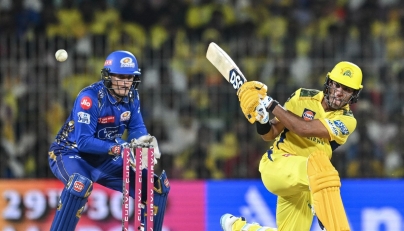 Chennai Super Kings' Rachin Ravindra (R) plays a shot during the Indian Premier League (IPL) Twenty20 cricket match between Chennai Super Kings and Mumbai Indians at the MA Chidambaram Stadium in Chennai on March 23, 2025. (Photo by R.Satish BABU / AFP)