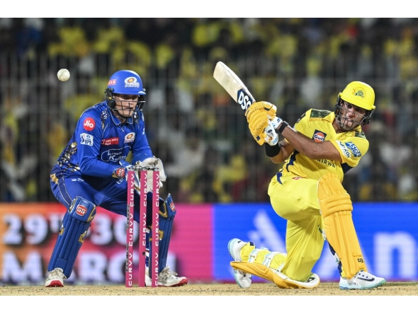 Chennai Super Kings' Rachin Ravindra (R) plays a shot during the Indian Premier League (IPL) Twenty20 cricket match between Chennai Super Kings and Mumbai Indians at the MA Chidambaram Stadium in Chennai on March 23, 2025. (Photo by R.Satish BABU / AFP)