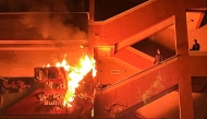 Palestinians try to put out a fire at the emergency department of the Nasser hospital after it was hit in an Israeli airstrike, in Khan Yunis in the southern Gaza Strip on March 23, 2025. (Photo by AFP)