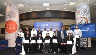 Officials pose for a group photo with winners of the first edition of the National Finance Researcher Award ceremony.