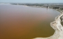 An aerial view of Lake Retba, known as the Pink Lake, in Senegal on March 19, 2025. (Photo by PATRICK MEINHARDT / AFP)
