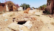 This picture taken on March 13, 2025, shows a makeshift bunker dug by civilians in North Darfur state capital El-Fasher, as a hideout from clashes between the paramilitary Rapid Support Forces (RSF) and the Sudanese army and allied militias. (Photo by Muammar Ibrahim / AFP)
