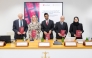Officials pose for a group photo during the launch of legal guide on the QFC Court and Regulatory Tribunal, recently.