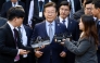 South Korean opposition leader Lee Jae-myung (C) leaves the Seoul Central District Court in Seoul on November 15, 2024. Photo by ANTHONY WALLACE / AFP
