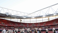 Real Madrid's players take part in a training session at the Emirates stadium in London on April 7, 2025, on the eve of their UEFA Champions League Quarter final first leg football match against Arsenal. (Photo by Adrian DENNIS / AFP)