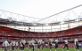 Real Madrid's players take part in a training session at the Emirates stadium in London on April 7, 2025, on the eve of their UEFA Champions League Quarter final first leg football match against Arsenal. (Photo by Adrian DENNIS / AFP)