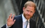 Britain's Prince Harry, Duke of Sussex waves as he arrives at the the Royal Courts of Justice, Britain's High Court, in central London, on April 8, 2025. Photo by JUSTIN TALLIS / AFP