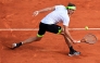 Germany's Alexander Zverev returns the ball to Italy's Matteo Berrettini during the Monte Carlo ATP Masters Series Tournament round of 32 tennis match on the Rainier III court at the Monte Carlo Country Club in Roquebrune-Cap-Martin on April 8, 2025. (Photo by Valery HACHE / AFP)