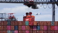 A shipping container is moved at the Port Jersey Container Terminal in Jersey City, New Jersey on April 8, 2025. (Photo by Charly Triballeau / AFP)
