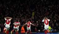 Arsenal's English midfielder #41 Declan Rice celebrates scoring the team's second goal during the UEFA Champions League Quarter final first leg football match between Arsenal and Real Madrid, at the Emirates Stadium, in London, on April 8, 2025. (Photo by Adrian Dennis / AFP)
 