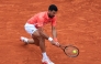 Serbia's Novak Djokovic plays a backhand return to Chile's Alejandro Tabilo during the Monte Carlo ATP Masters Series Tournament round of 32 tennis match on the Ranier III court at the Monte Carlo Country Club in Roquebrune-Cap-Martin on April 9, 2025. (Photo by Valery HACHE / AFP)