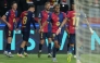 Barcelona's Spanish forward #19 Lamine Yamal and teammates celebrate Barcelona's Polish forward #09 Robert Lewandowski's third goal during the UEFA Champions League Quarter final First Leg football match between FC Barcelona and BVB Borussia Dortmund at the Estadi Olimpic Lluis Companys in Barcelona on April 9, 2025. (Photo by LLUIS GENE / AFP)
