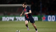 Paris Saint-Germain's Georgian forward #07 Khvicha Kvaratskhelia runs with the ball towards goal to score Paris Saint-Germain's second goal during the UEFA Champions League Quarter final first leg football match between Paris Saint-Germain (FRA) and Aston Villa (ENG) at the Parc des Princes stadium in Paris on April 9, 2025. (Photo by Thibaud MORITZ / AFP)
