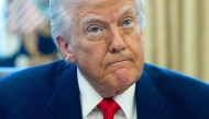 US President Donald Trump speaks after signing an executive order in the Oval Office of the White House on April 9, 2025 in Washington, DC. (Photo by Saul Loeb / AFP)