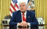 US President Donald Trump looks on after signing an executive order in the Oval Office of the White House on April 9, 2025 in Washington, DC. (Photo by Saul Loeb / AFP)