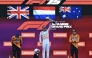 (L-R) Second-placed McLaren's British driver Lando Norris, winner Red Bull Racing's Dutch driver Max Verstappen, and third-placed McLaren's Australian driver Oscar Piastri celebrate on the podium after the Formula One Japanese Grand Prix at the Suzuka circuit in Suzuka, Mie prefecture, Japan on April 6, 2025. Photo by MOHD RASFAN / AFP.
