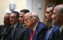 US President Donald Trump (C) looks on during a cabinet meeting in the Cabinet Room of the White House on April 10, 2025, in Washington, DC. Photo by Brendan SMIALOWSKI / AFP.