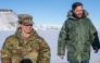 US Vice President JD Vance walks with Col. Susan Meyers (L), commander of the US military's Pituffik Space Base, as they tour the base in Greenland on March 28, 2025. (Photo by Jim WATSON / POOL / AFP)
