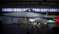 A Bulgarian pilot touches the first Bulgarian F-16 Block 70 fighter aircraft after a ceremony marking it's arrival at Graf Ignatievo airbase on April 13, 2025. Photo by Nikolay DOYCHINOV / AFP