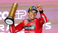 Ducati Lenovo’s Marc Marquez celebrates with the trophy after winning the MotoGP Qatar Grand Prix. PICTURES: AFP/LIC 