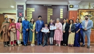 Prize winning students with school officials.