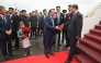 This handout photo taken and released by Malaysia's Department of Information on April 15, 2025 shows Malaysia's Prime Minister Anwar Ibrahim (C) shaking hands with China's President Xi Jinping (R) upon his arrival at the Bunga Raya VIP complex of Kuala Lumpur International Airport in Sepang. (Photo by Farhan ABDULLAH / MALAYSIA'S DEPARTMENT OF INFORMATION / AFP)