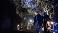 Wits University students walk up a flight of stairs at the Sterkfontein caves located within the Cradle of Humankind UNESCO World Heritage Site in Krugersdorp near Johannesburg on April 15, 2025. (Photo by Emmanuel Croset / AFP)