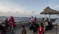 File: People spend time by the ocean in Malé, Maldives. (Photo by Saumya Khandelwal/For The Washington Post)
