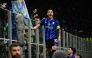 Inter Milan's Argentine forward #10 Lautaro Martinez celebrates scoring his team's first goal during the UEFA Champions League quarter final second leg football match between Inter Milan and Bayern Munich at the San Siro stadium in Milan on April 16, 2025. (Photo by Marco BERTORELLO / AFP)
