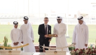 Minister of Interior and Commander of the Internal Security Force (Lekhwiya) H E Sheikh Khalifa bin Hamad bin Khalifa Al-Thani with the Managing Director of Qatar Shell Rob Maxwell.  