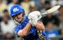 Mumbai Indians' Will Jacks watches the ball after playing a shot during the Indian Premier League (IPL) Twenty20 cricket match between Mumbai Indians and Sunrisers Hyderabad at the Wankhede Stadium in Mumbai on April 17, 2025. (Photo by Punit PARANJPE / AFP)