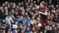 Manchester City's Belgian midfielder #17 Kevin De Bruyne runs with the ball during the English Premier League football match between Everton and Manchester City at Goodison Park in Liverpool, north west England on April 19, 2025. (Photo by Paul ELLIS / AFP)
