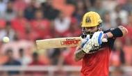 Royal Challengers Bengaluru's Virat Kohli plays a shot during the Indian Premier League (IPL) Twenty20 cricket match between Punjab Kings and Royal Challengers Bengaluru at the Maharaja Yadavindra Singh International Cricket Stadium on the outskirts of Chandigarh on April 20, 2025. (Photo by Shammi MEHRA / AFP)