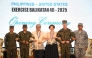 (From left) Philippines Major General Francisco Lorenzo, Philippines exercise director, Philippines military chief General Romeo Brawner, Philippines Secretary of Foreign Affairs US Ambassador to the Philippines Marykay Carlson, US marines Lieutenant General James Glynn, commander of the US marines Pacific and Philippines air force Major general Llewillyn Banaag link arms during the opening ceremony of the annual US-Philippines Balikatan joint military exercise at camp Aguinaldo in Manila on April 21, 2025. (Photo by Ted Aljibe / AFP)