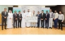 LuLu Hypermarket Qatar officials handing over the donation cheque.