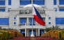 This photo shows the Philippine national flag flying at half-mast at the city hall in Tacloban City, province of Leyte on April 22, 2025, a day after the death of Pope Francis. Photo by Jam STA ROSA / AFP