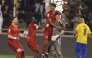 Al Duhail players celebrate with goalkeeper Bautista Burke after the win. 