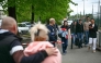 Students evacuate the high school Notre-Dame de Toutes-Aides before a Police Municipal officer surrounds the scene of crime with a Police tape after a knife attack, one student was killed and three other were wounded in Nantes, western France, on April 24, 2025. (Photo by Loic VENANCE / AFP)
