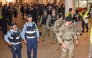 US miliary personnel join Japanese officials and residents for a one-off joint nighttime patrol on the streets of Okinawa City, Okinawa prefecture late on April 18, 2025, in the first such joint operation since 1973, following sexual assault cases involving US servicemen. (Photo by Hiroaki YAMASHIRO / AFP)
