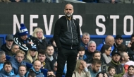 Manchester City's Spanish manager Pep Guardiola looks on during the English Premier League football match between Everton and Manchester City at Goodison Park in Liverpool, north west England on April 19, 2025. Photo by Paul ELLIS / AFP.