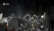 This handout photograph taken and released by the State Emergency Service of Ukraine on April 24, 2025, shows Ukrainian rescuers operating at the site of a Russian missile attack in Kyiv, amid the Russian invasion of Ukraine. Photo by Handout / State Emergency Service of Ukraine / AFP.