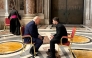 In this handout photograph taken and released by the Ukrainian Presidential Press Service in Kyiv on April 26, 2025, Ukraine's President Volodymyr Zelensky (R) meets with US President Donald Trump (L) on the sidelines of Pope Francis's funeral at St. Peter's Basilica at the Vatican. (Photo by Handout / UKRAINIAN PRESIDENTIAL PRESS SERVICE / AFP) 