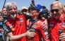 Ducati Lenovo Team's Spanish rider Marc Marquez (C) celebrates after winning the the MotoGP Spanish Grand Prix Sprint race at the Jerez racetrack in Jerez de la Frontera, on April 26, 2025. (Photo by JORGE GUERRERO / AFP)
