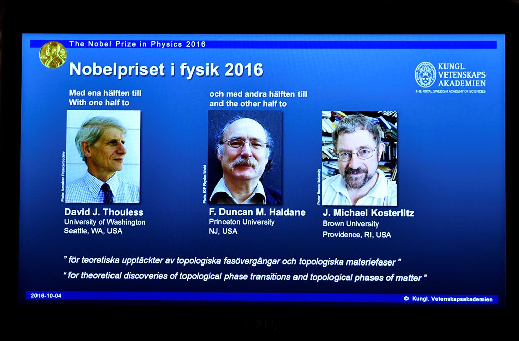 A screen showing pictures of the winners of the 2016 Nobel Prize for Physics during a news conference by the Royal Swedish Academy of Sciences in Stockholm, Sweden October 4, 2016. From left: David Thouless, Duncan Haldane and Michael Kosterlitz. (TT News