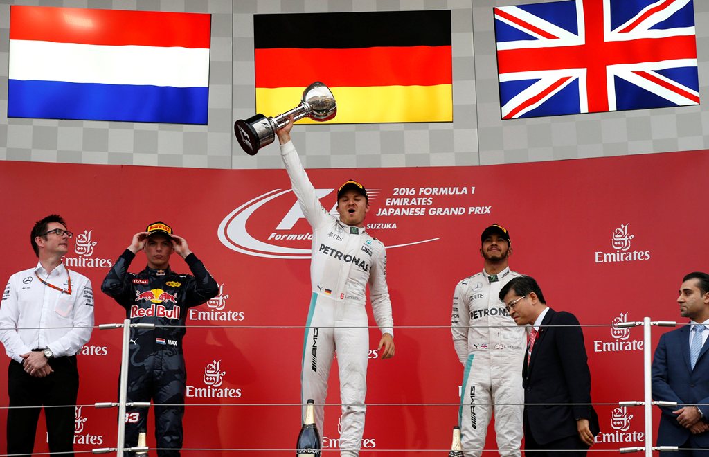 Mercedes' driver Nico Rosberg of Germany celebrates winning the race. (Reuters/Toru Hanai)