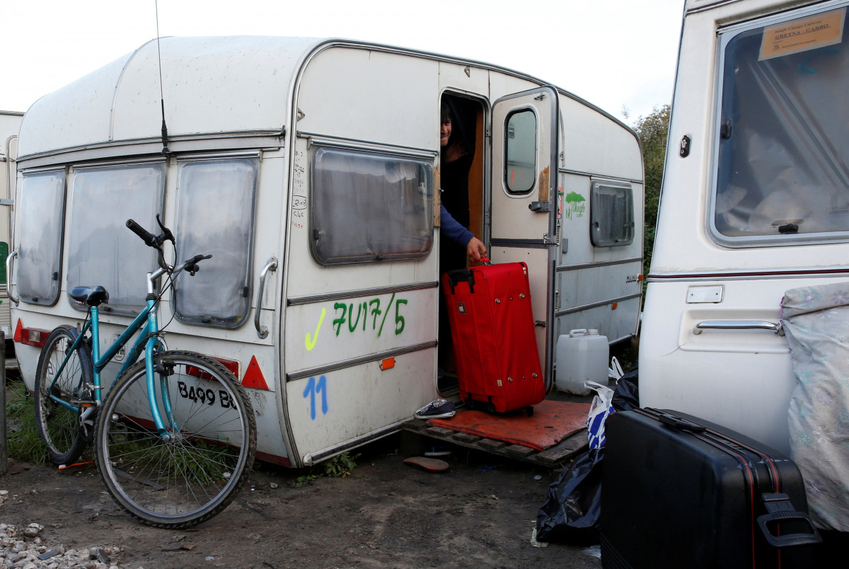 Nasir, aged 23, a migrant from Afghanistan's Baghlan province, leaves his caravan and the 