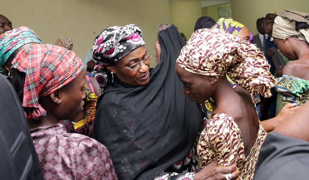 Nigeria's Vice President Yemi Osinbajo (not seen) and Nigeria's Minister of Information and Culture Alhaji Lai Mohammed (not seen) welcome some of the freed Chibok school girls at the state House in Abuja, Nigeria on October 13, 2016. Twenty-one of the Ch