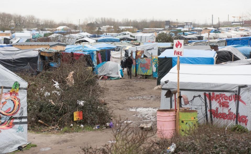 The ramshackle camp at Calais houses thousands of migrants and refugees attempting to make it to Britain, which bars most of them on the basis of EU rules requiring them to seek asylum in the first European country they set foot in. (AFP / Denis Charlet) 