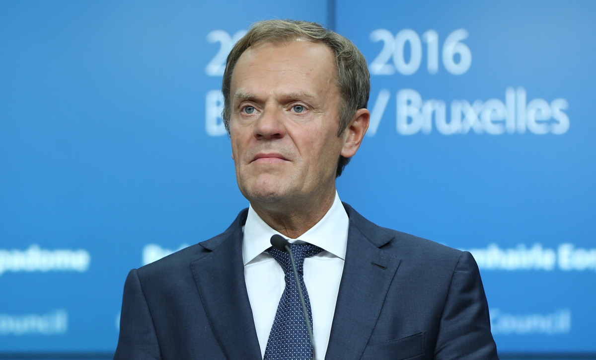 EU council President Donald Tusk and European Commission President Jean-Claude Juncker (not seen) hold a press conference at the end of the first day of the European Summit in Brussels, Belgium early Friday, Oct. 21, 2016. (Dursun Aydemir - Anadolu Agency